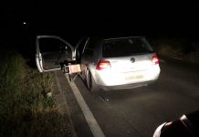 Police stop car and arrest two for multiple offences