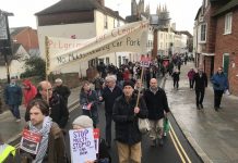 Pilgrims call on council to replace multi-storey car park plan with transport hub Protesters take to streets