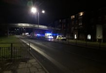 UPDATED: Road closed after pedestrian falls from bridge